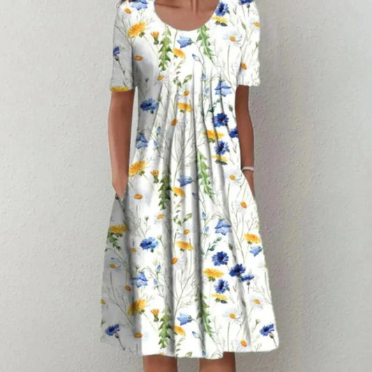Clara | Mujer vestido midi floral con manga corta y bolsillos