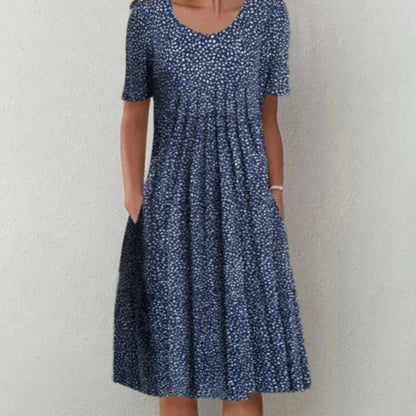 Clara | Mujer vestido midi floral con manga corta y bolsillos