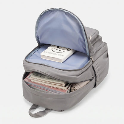 Momo | Mochila con varios bolsillos y bolsillo frontal amplio
